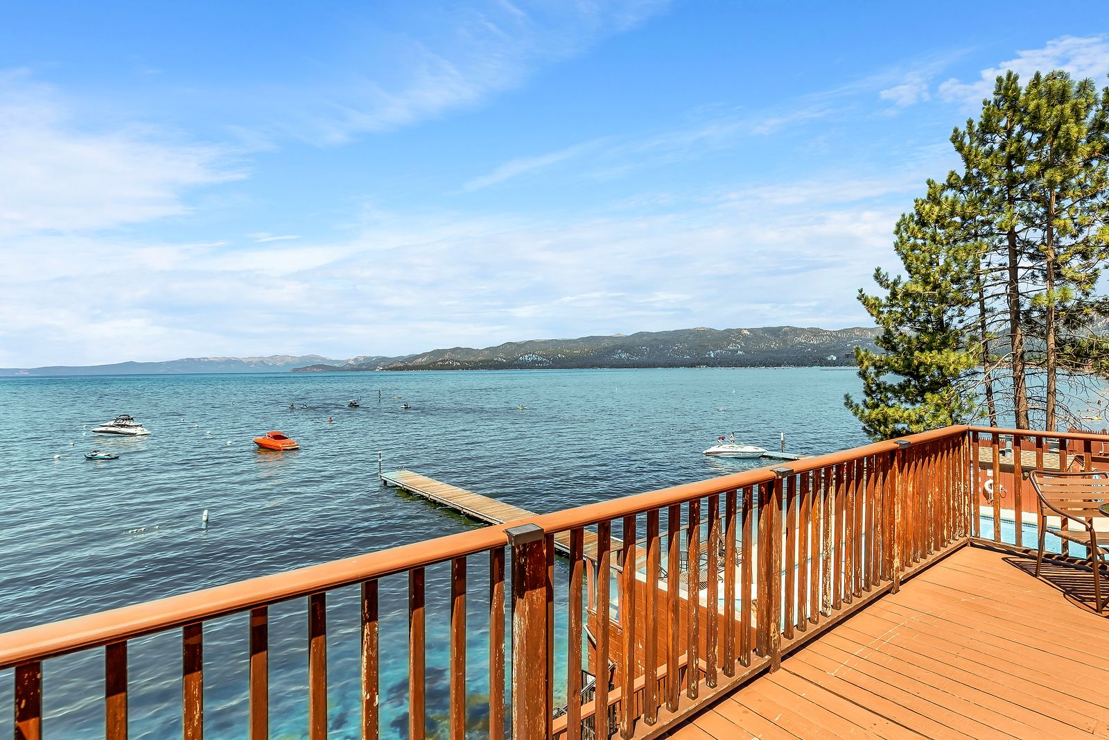 Boats on mooring buoys off the Beachcomber Inn's private dock, seen from the observation deck