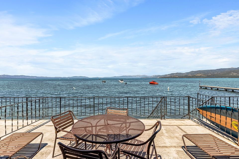 Private deck at the water's edge with a view of Lake Tahoe, Unit C at the Beachcomber Inn