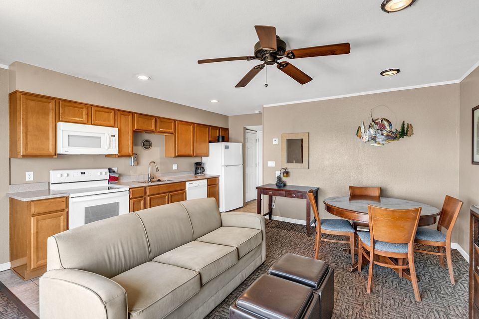 Kitchen, dining table, and sofa, Unit C at the Beachcomber Inn