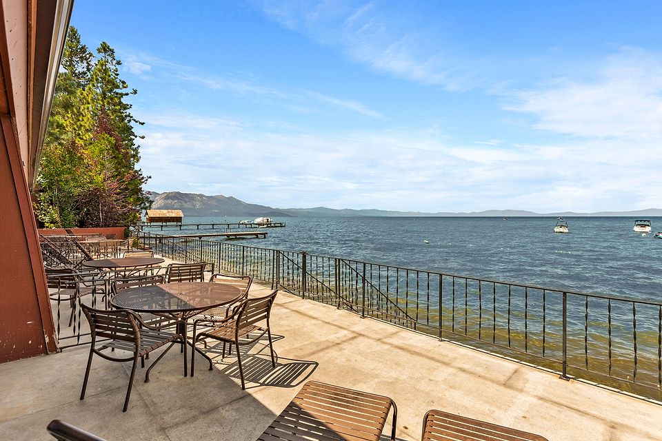 Private deck at the water's edge with a view of Lake Tahoe, Unit D at the Beachcomber Inn
