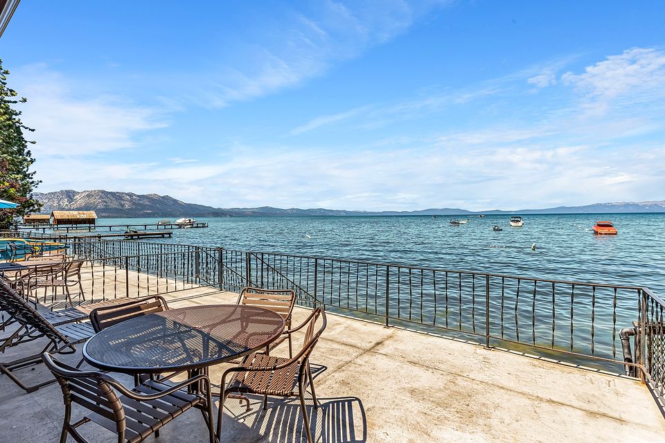 Private deck at the water's edge with a view of Lake Tahoe, Unit F at the Beachcomber Inn