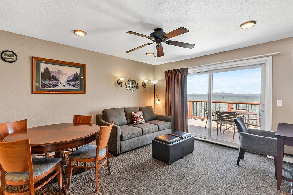 Living and dining area looking out at Lake Tahoe, Unit I at the Beachcomber Inn