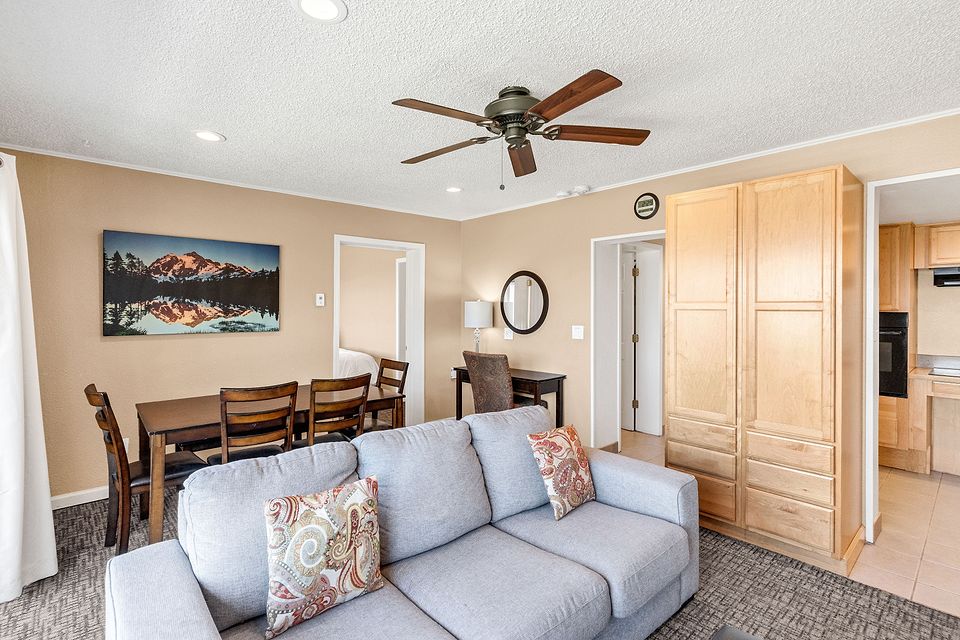 Living room and dining table, Unit L at the Beachcomber Inn