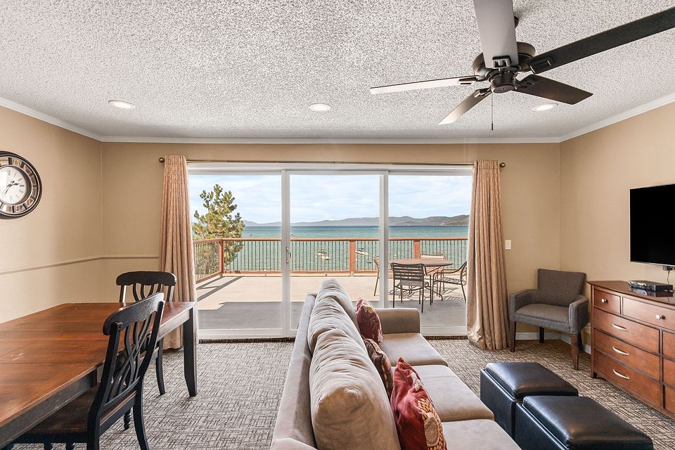 Living room looking out at Lake Tahoe, Unit M at the Beachcomber Inn