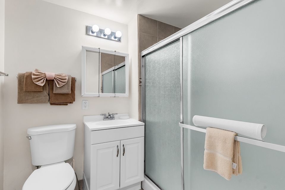 Bathroom with a walk-in shower, Unit N at the Beachcomber Inn