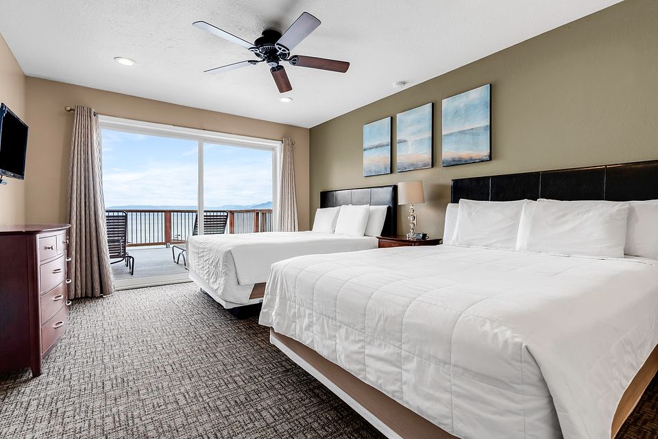 Bedroom with two beds and a view of Lake Tahoe, Unit N at the Beachcomber Inn