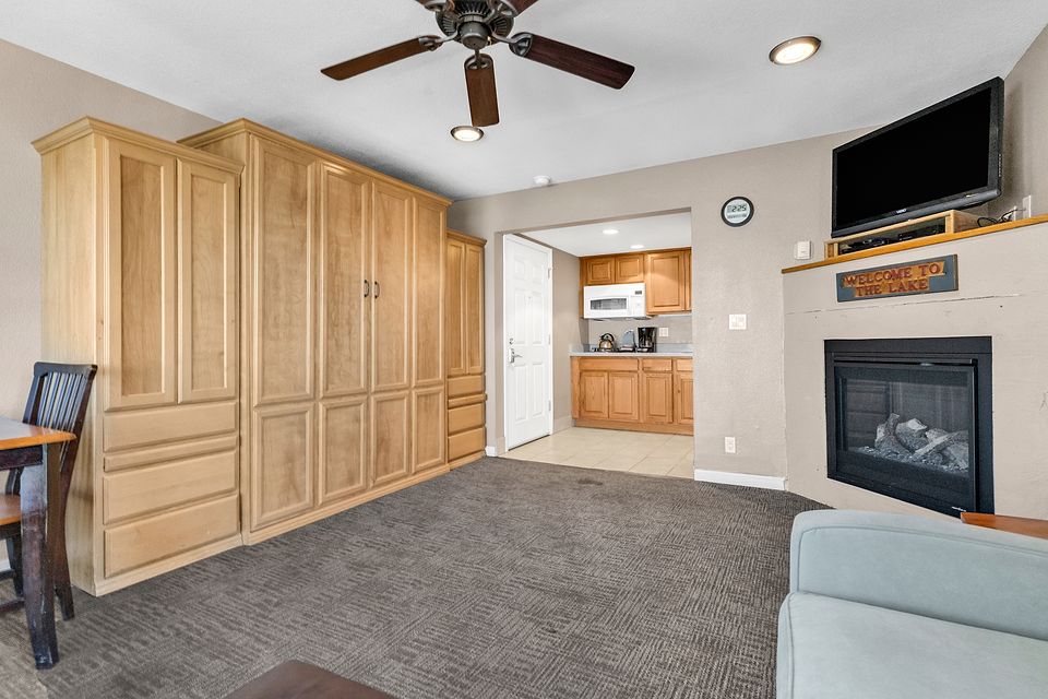 Wall bed cabinet and the fireplace, Unit R at the Beachcomber Inn