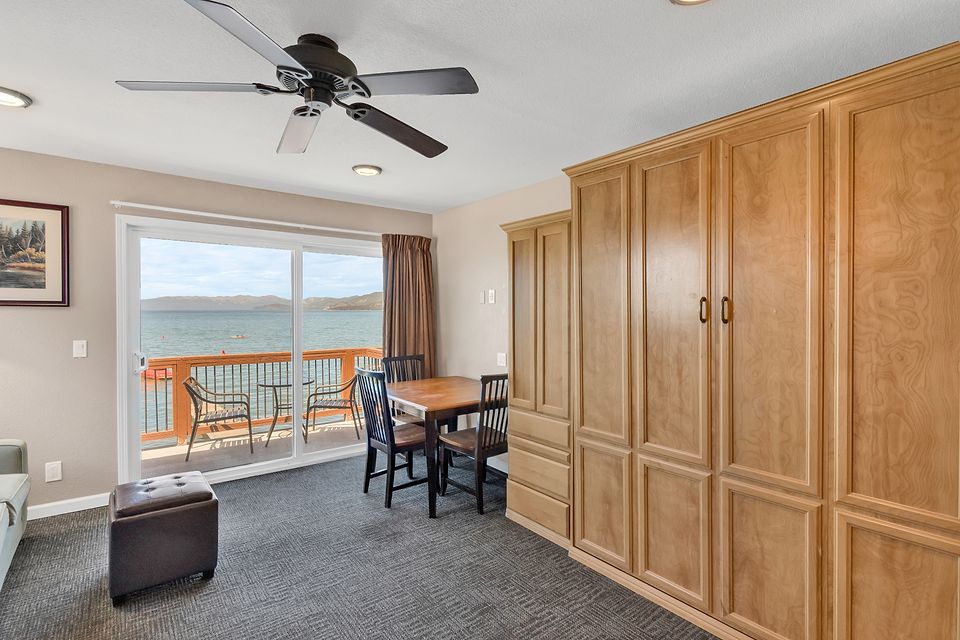 Dining table and the slider to the deck, Unit R at the Beachcomber Inn