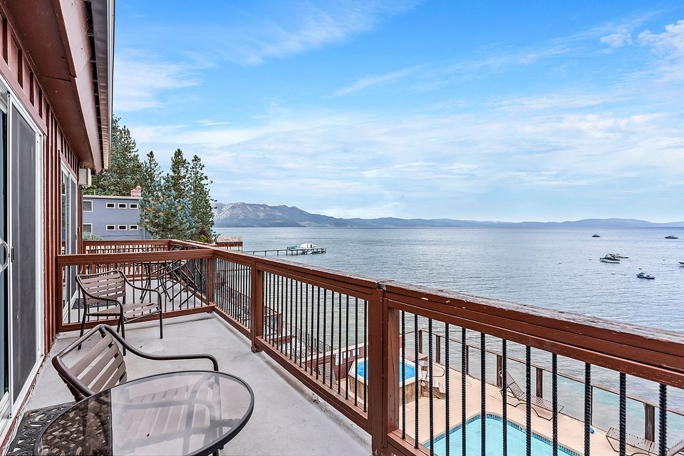 Private deck above the pool with a view of Lake Tahoe, Unit S at the Beachcomber Inn